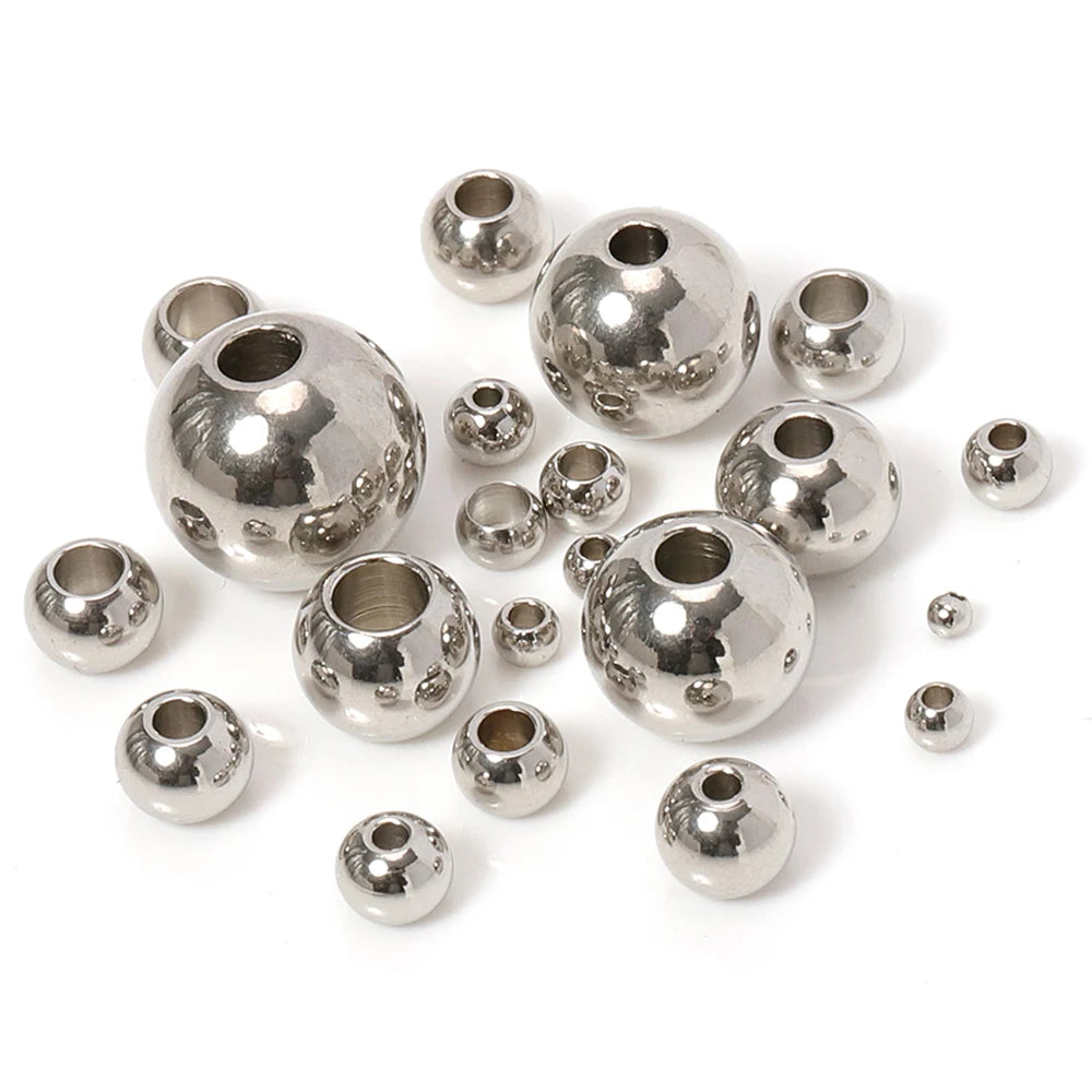 Cuentas espaciadoras de acero inoxidable (100 piezas)